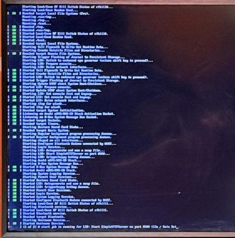 Close up of the left screen from the previous photo, rotated to make the messages a little easier to read (although the photo was from a little too far back to make the text clear).