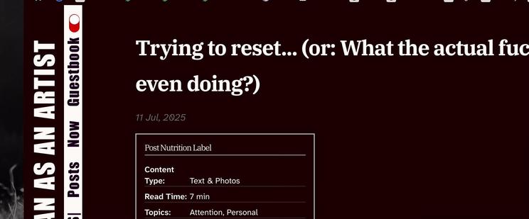 My website with white text on an off-black background.
