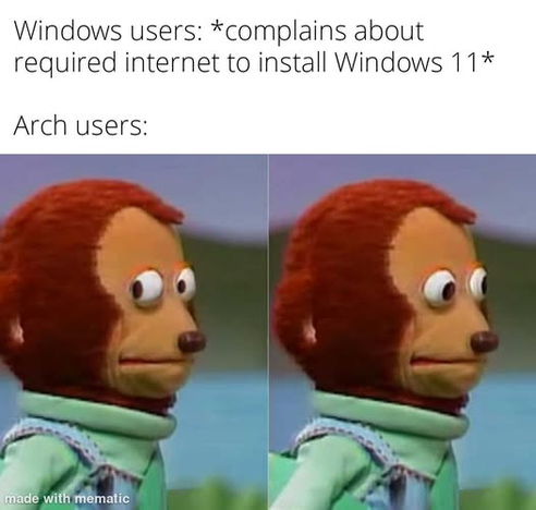 A two-panel meme featuring a monkey with big eyes. The top text reads "Windows users: complains about required internet to install Windows 11". The bottom text reads "Arch users:", implying that Arch Linux requires the Internet to install and download various pacakges.