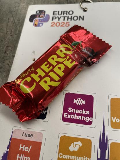 Australian snack on top of a badge with snack exchange sticker.