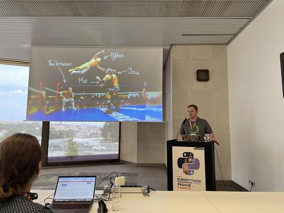 photo from the tutorial, showwing Nicolas and a slide featuring Wrestling.