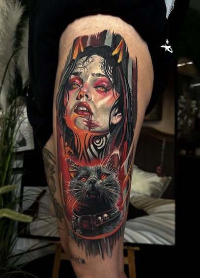 Une succube with tattoos in her neck tattooed on an upperleg. A black cat with red background finishes the tattoo.