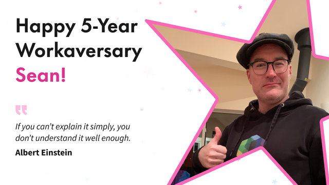 A cheerful work anniversary graphic celebrating Sean. On the right, Sean stands indoors giving a thumbs-up, wearing a flat cap, glasses, and a black hoodie with a colorful geometric logo. He has a clean-shaven face and no visible hair. On the left, bold text reads “Happy 5-Year Workaversary Sean!” followed by a quote: “If you can’t explain it simply, you don’t understand it well enough.” — Albert Einstein. Pink and blue stars dot the background, adding a celebratory tone.