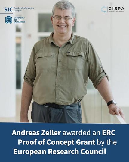 CISPA Faculty member Prof. Dr. Andreas Zeller. In front of him, there's a banner that says "Andreas Zeller awarded an ERC Proof of Concept Grant by the European Research Council." Photo by: CISPA