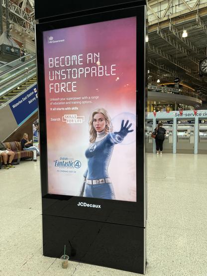 Digital billboard featuring the Invisible Woman from the Fantastic Four