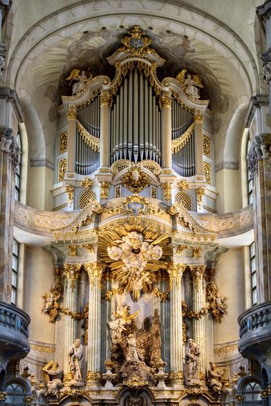 Gilded white marble altar in an opulent Baroque church