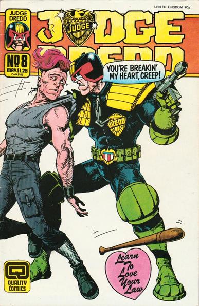The front cover of Judge Dredd, Vol 2, No 8 for May 1987, featuring cover art by Brett Ewins showing Dredd nicking a punky guy with a pink mohican.
