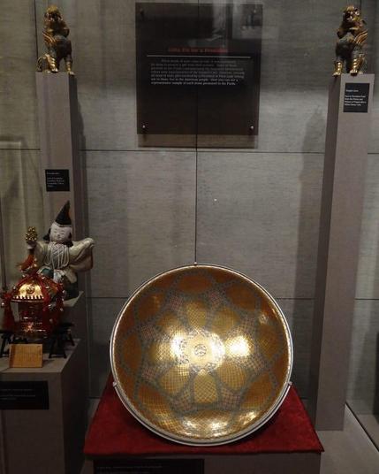 A mikoshi (Japanese: 神輿) is a sacred religious palanquin (also translated as portable Shinto shrine). Shinto followers believe that it serves as the vehicle to transport a deity in Japan while moving between main shrine and temporary shrine during a festival or when moving to a new shrine. Often, the mikoshi resembles a miniature building, with pillars, walls, a roof, a veranda and a railing.