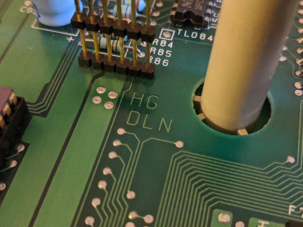 Amiga 1000 motherboard with the initials "DLN." (There are also the initials "HG" but I am not sure what those stand for.)