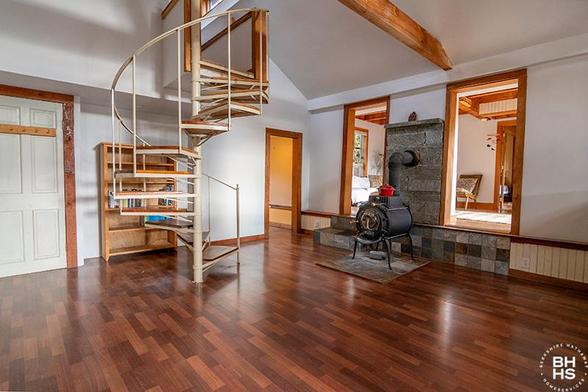 ESSEX HOME NESTLED IN THE WOODS
Spiral Staircase Woodstove