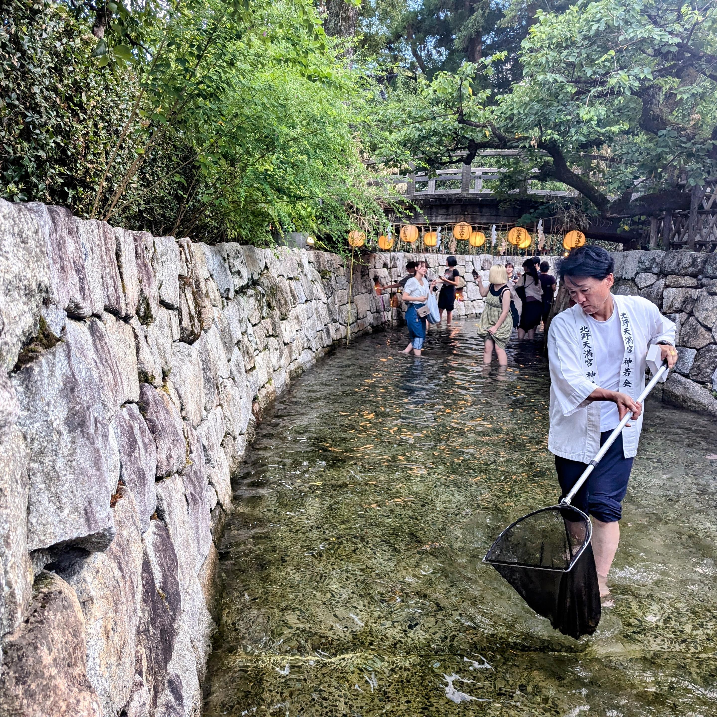 Sweeping the Mitarashi Pond for lots items and stray candles.
