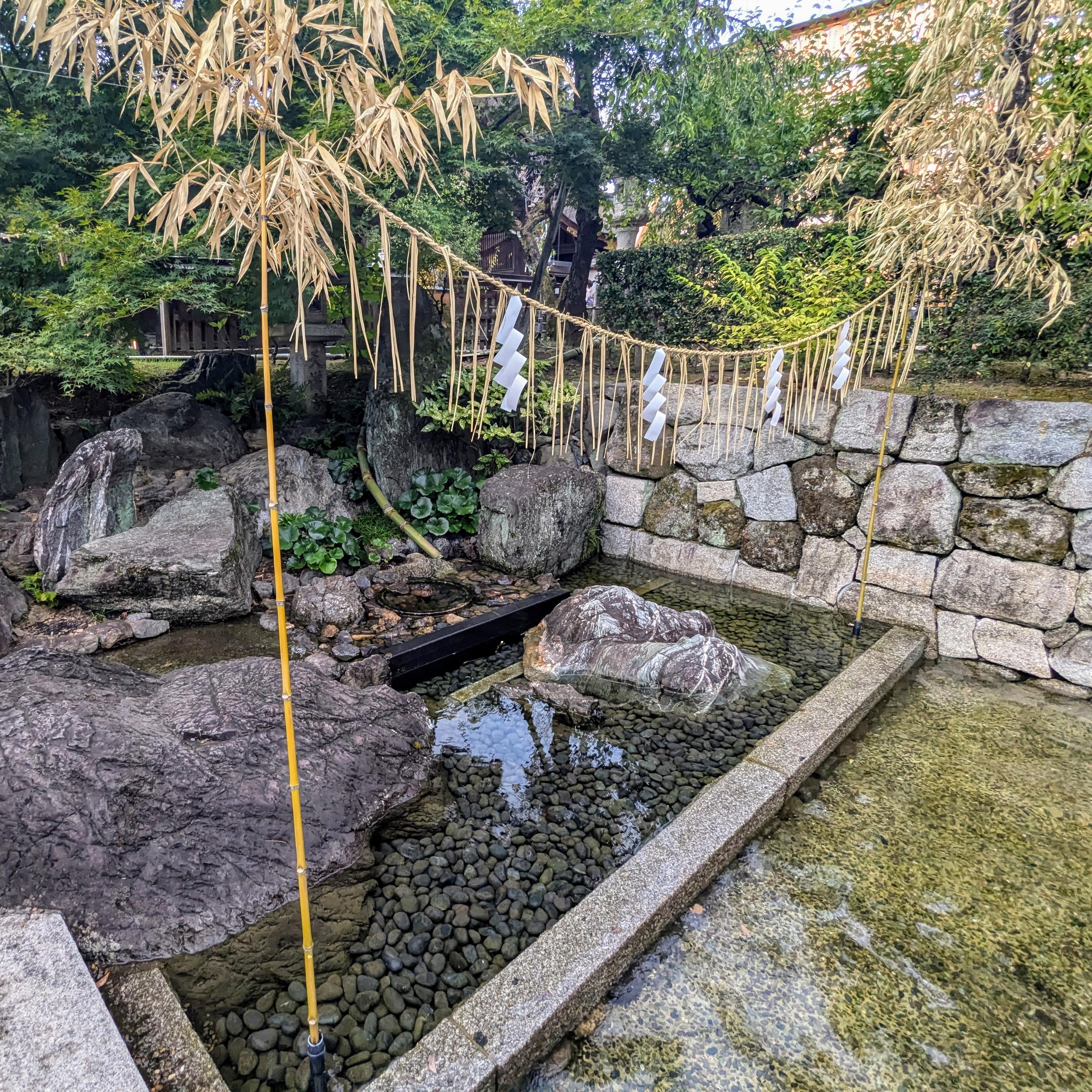 Sacred area at the end of the Mitarashi Pond at Kitano Tenman-gu.