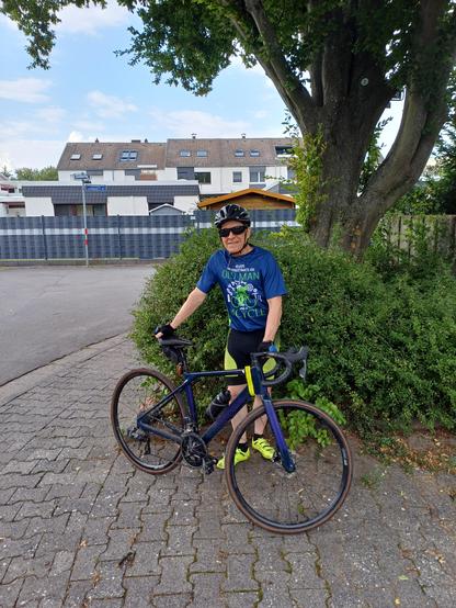 I've just returned from a brisk training ride. It takes 45 minutes and is fairly flat. T-shirt says never to underestimate an old man with a cycle. Bike is my 2023 Canyon Endurace.