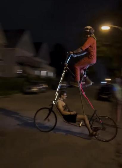 A two person tall bike.