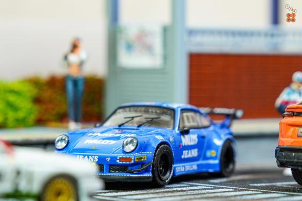 Porsche RWB 930 Wally's Jeans livery by Tarmac Works in 1:64 scale with 1:64 figure on AREA 164