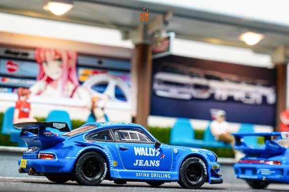 A side shot of Porsche RWB 930 Wally's Jeans livery by Tarmac Works in 1:64 scale with 1:64 figures on AREA 164