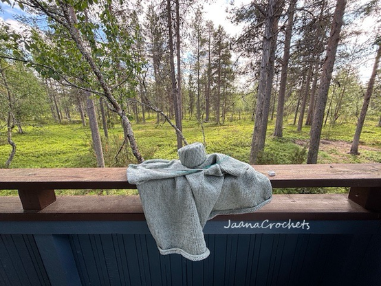 Unfinished knitting tee on the terrace in Lapland 