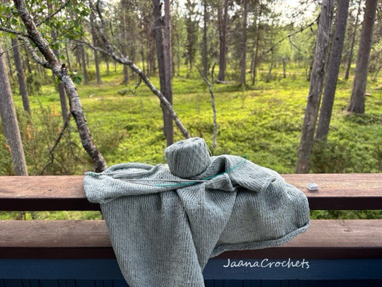 Unfinished knitting tee on the terrace in Lapland 