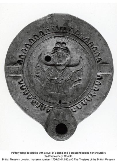 Mould-made pottery oil lamp decorated on the discus with a bust of Selene, with bull-protomes on each side and a lunar crescent behind her shoulders.