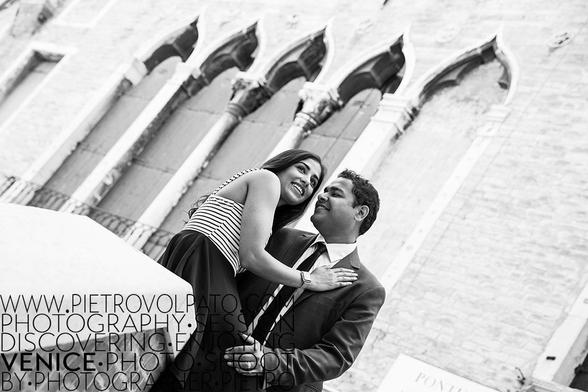 A couple enjoys a moment in Venice. Getting lost is all you need to fully enjoy this city.
