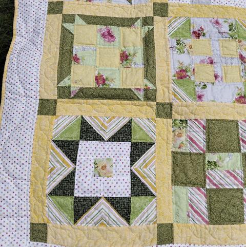 a close-up of the face of the quilt 