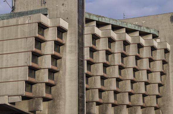 a close-up of the staggered windows 