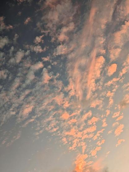 Clouds illuminated by the setting sun