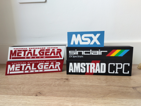 Cajas retroiluminadas de Metal Gear, MSX, Sinclair ZX Spectrum y Amstrad CPC.