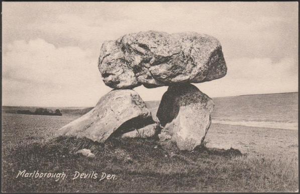A printed vintage postcard showing the Devil's Den, between Fyfield and Clatford near Marlborough in Wiltshire, a Neolithic dolmen or chambered tomb with a couple of cup-marks on the capstone.