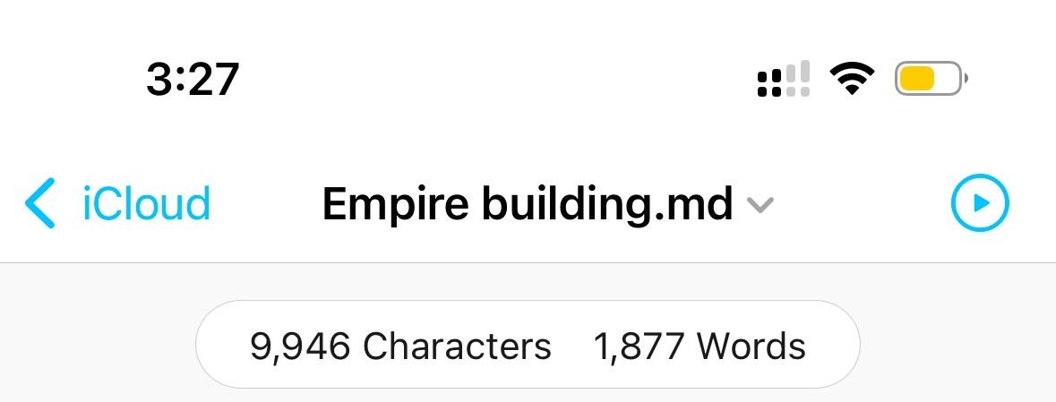 The image shows a smartphone screen displaying a file titled "Empire building.md," with details about the file size (9,946 characters and 1,877 words) and the current time (3:27).