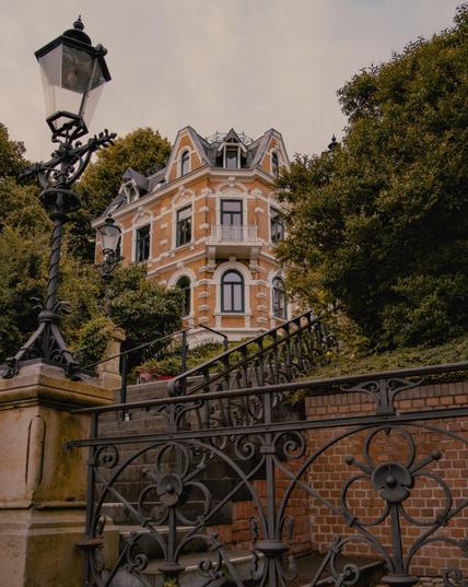 Corner House behind old stairs and Street light