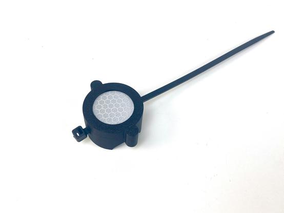 A 3D printed bike reflector / AirTag holder.