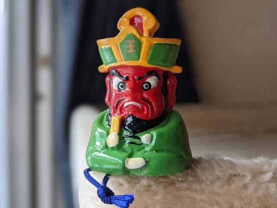Small omikuji holder in the shape of Enma, the 'Hell King'.