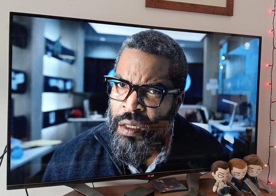 Ice Cube looks concerned about something