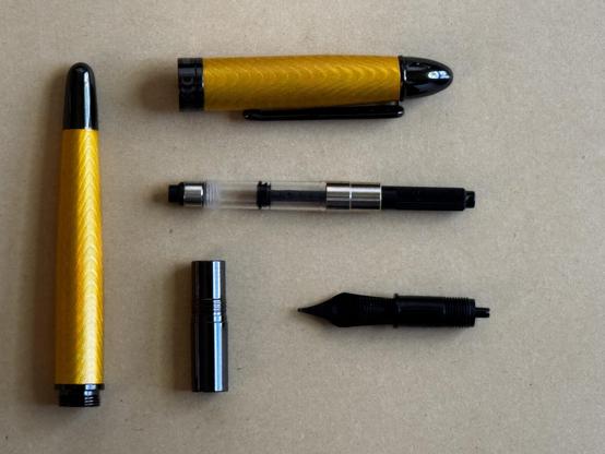 Conklin Herringbone fountain pen. Yellow. Disassembled. 