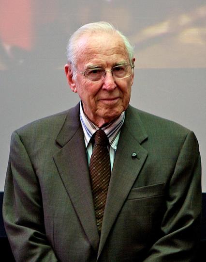 Apollo 13 mission commander Jim Lovell listens to introductions at the overflow area in the Milestones of Flight exhibit at the National Air and Space Museum on April 15, 2010.