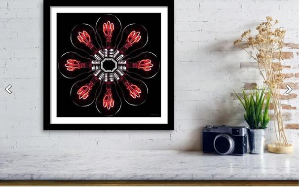 Red lightbulbs on black in a square format in a shelf home setting by Sharon Cummings.