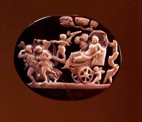 Onyx and sardonyx cameo of Dionysos seated on a chariot pulled by Maenads. A himation is draped around his hips and billowing over his head, suggesting movement. His pose is relaxed and lounging. Two maenads dressed in animal skins draw the chariot. Two winged Erotes play around the chariot, symbolising love and lust. One of them is holding a burning torch and the reins of the maenads pulling the chariot. Dionysos has his arm around another figure that is either seated in the chariot next to hi…