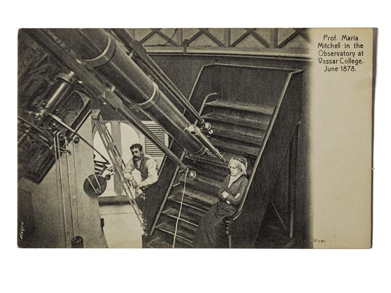 Postcard showing a woman sitting on the observing chair in front of a large refracting telescope. The accompanying text reads, “Prof. Maria Mitchell in the Observatory at Vassar College. June 1878.” The back is divided, with space for the address on the right and space for a message on the left. It is marked “Printed in Germany for Henry S. Wyer, Nantucket, Mass., U.S.A. No. 582” and indicates that a 1¢ stamp is required for domestic use and a 2¢ stamp for foreign use.

Maria Mitchell (1818-1889) was America’s first woman astronomer, America’s first woman scientist of note, and the first professor of astronomy at Vassar College.

Henry Sherman Wyer (1847-1920) was a photographer from Nantucket who published many of the earliest postcards of that island community. He was also active in the Nantucket Historical Society and the Maria Mitchell Association.

While the photograph on this postcard was taken in 1878, the postcard was published between March 1, 1907, (when postcards with a divided back were first permitted in the U.S.) and 1917 (when the domestic postage for a postcard was raised to 2¢).

https://www.si.edu/object/postcard:nmah_1372087
