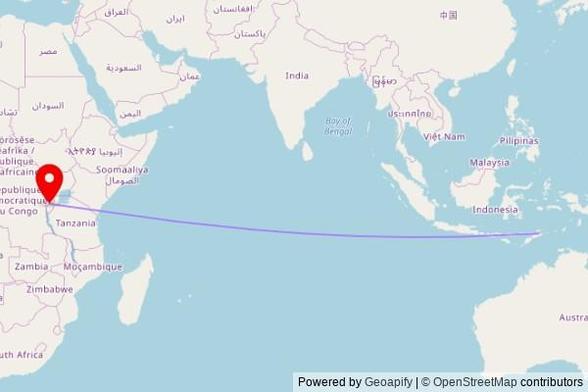A map showing the great circle route from Baucau in Timor-Leste to a map pin at Our Lady of Wisdom, DR91, Huye, Rwanda