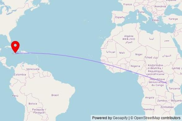 A map showing the great circle route from Huye in Rwanda to a map pin at Saint Helen Catholic Church, 13 King's Street, Linstead, Jamaica