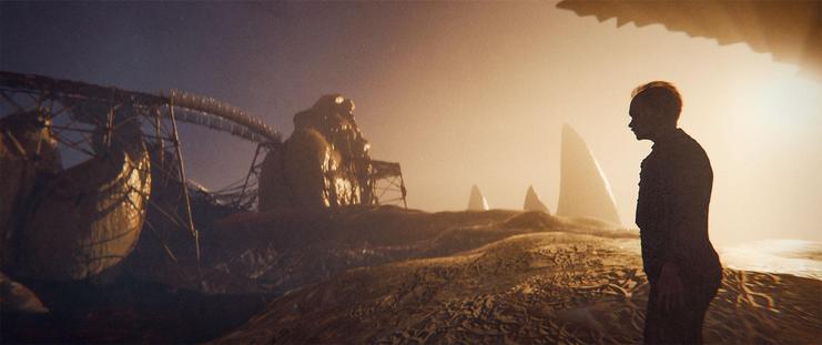 Wide shot, exterior, day -

A man stands outside of Toothtown, looking inward at the raised platform that ringed the center circle of teeth.