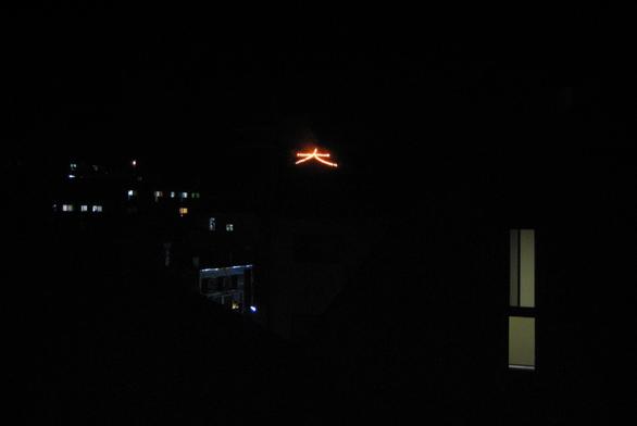 The distant orange Hidari Daimonji.