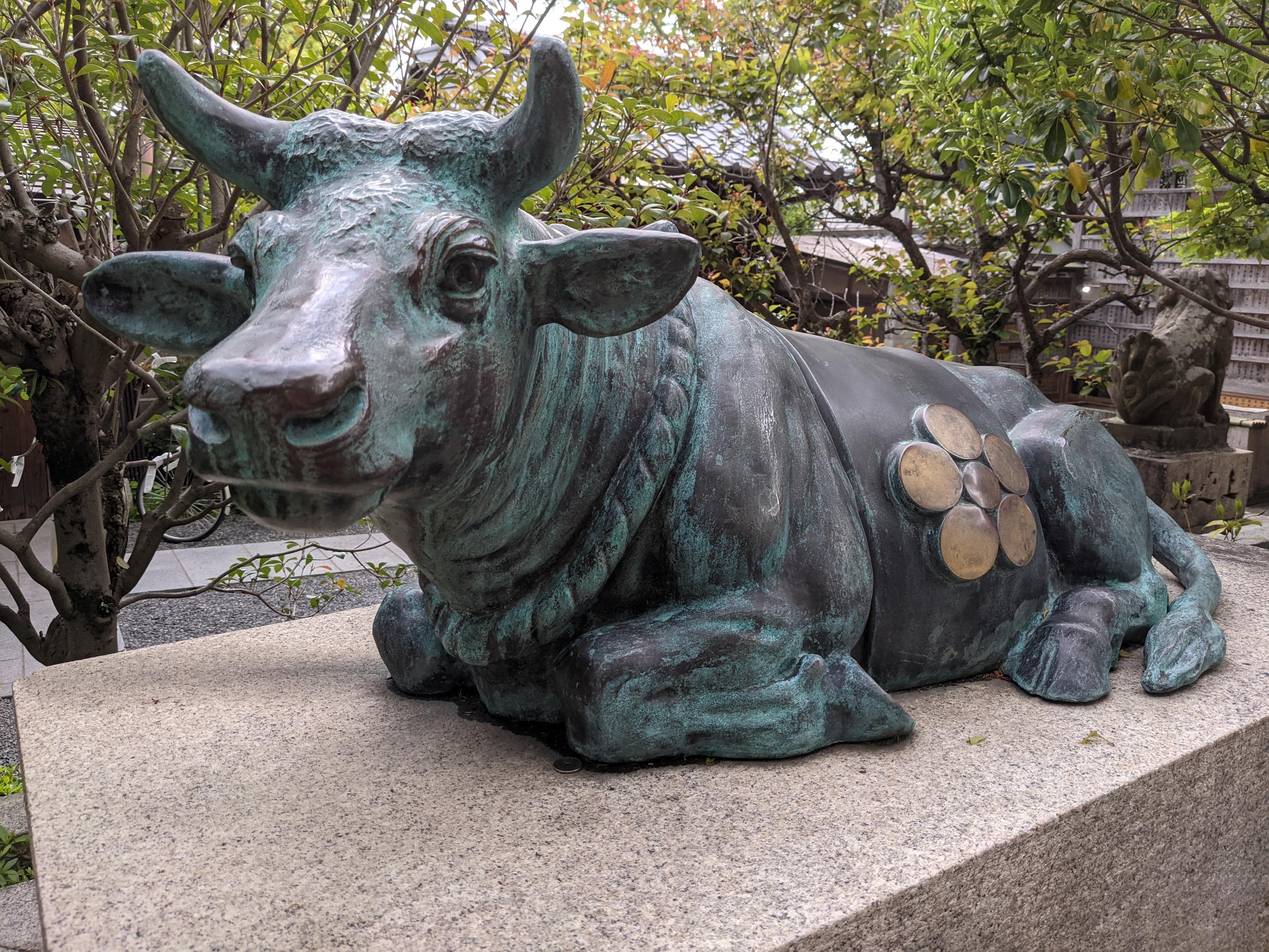 Ox statues are common in Tenmangu shrines. They are rubbed as a prayer (often people rub parts of the ox that corresponds to any illness or sickness they have on their own body).