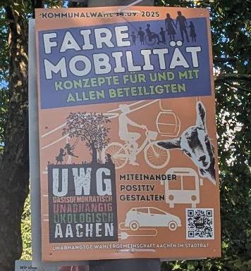 Wahlplakat der Unabhängigen Wählergemeinschaft Aachen im Stadtrat (UWG) auf orangenem Hintergrund sind stilisiert ein Elektroauto, ein Bus, eine Person auf dem Fahrrad, eine Seilbahn zu sehen. Von der Seite schaut ein Schaf den Leser an. Der Text auf dem Plakat lautet

Faire Mobilität
Konzepte für und mit allen Beteiligten

Miteinander positiv gestalten

UWG
Basisdemokratisch
Unabhängig
Ökologisch
Aachen