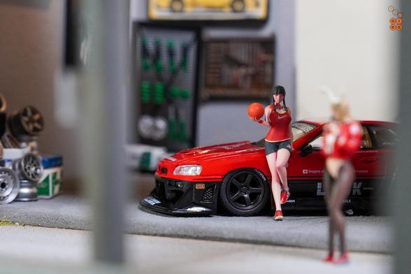 A basketball girl and Nissan Skyline LB-ER34 Super Silhouette by Mini GT in 1:64 scale on AREA 164