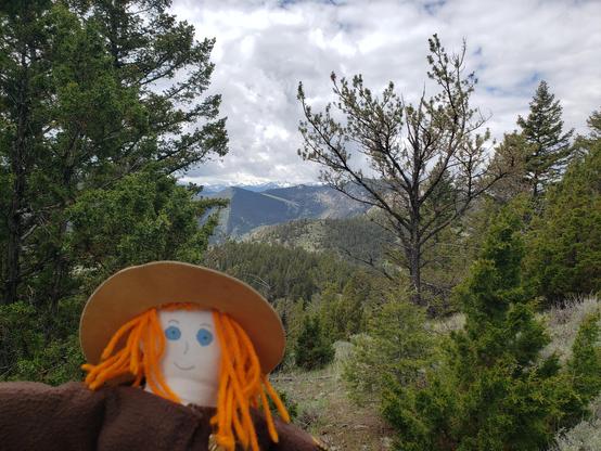 Ranger Sarah takes in the view, in the far distance are snow capped peaks.
— at Lewis & Clark Caverns State Park.
