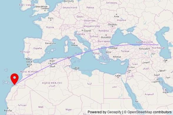 A map showing the great circle route from Nüqədi 1 in Azerbaijan to a map pin at Mosquée Arraha مسجد الحسن الثاني, Route 70, Laayoune, Morocco