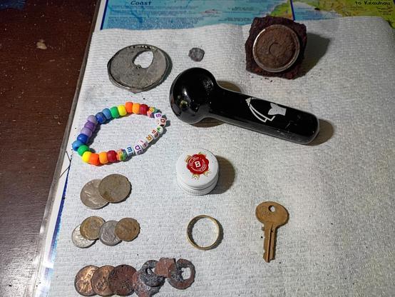 Gold ring and coins and a pot pipe found in Hawaii