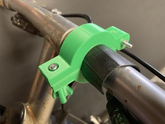 A 3D printed handlebar clamp.